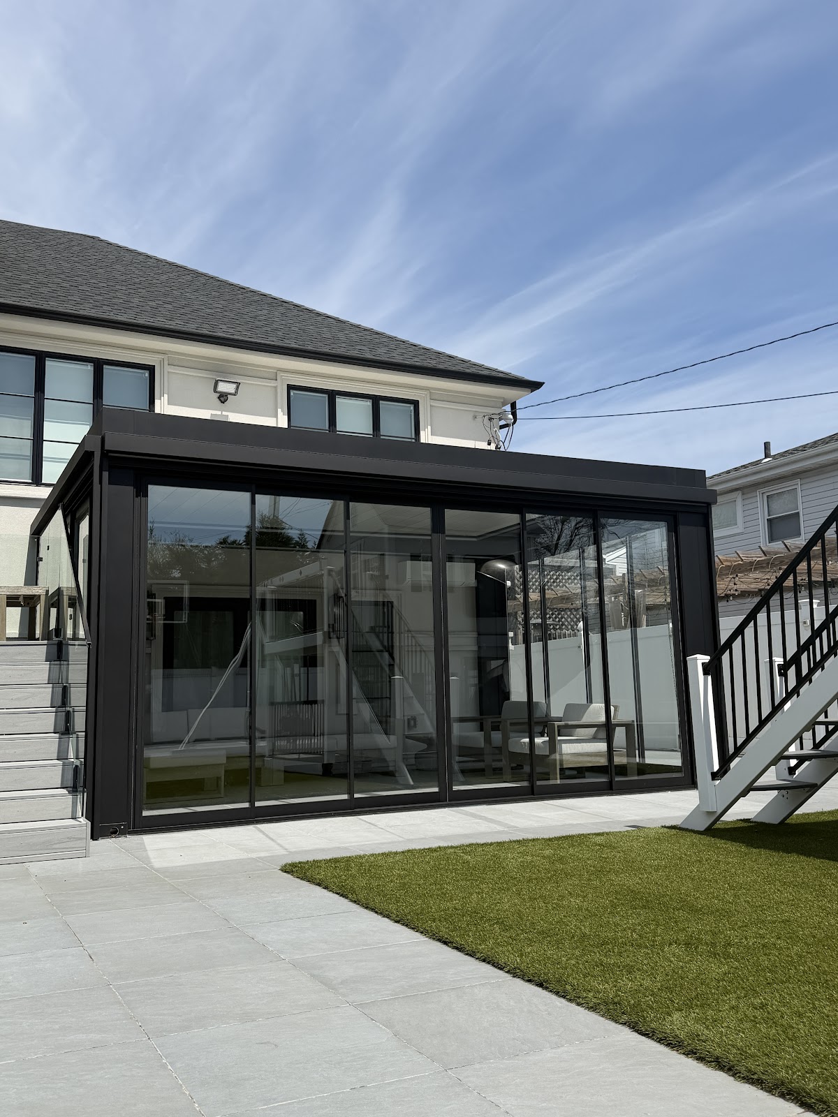 Full exterior pergola view with lawn